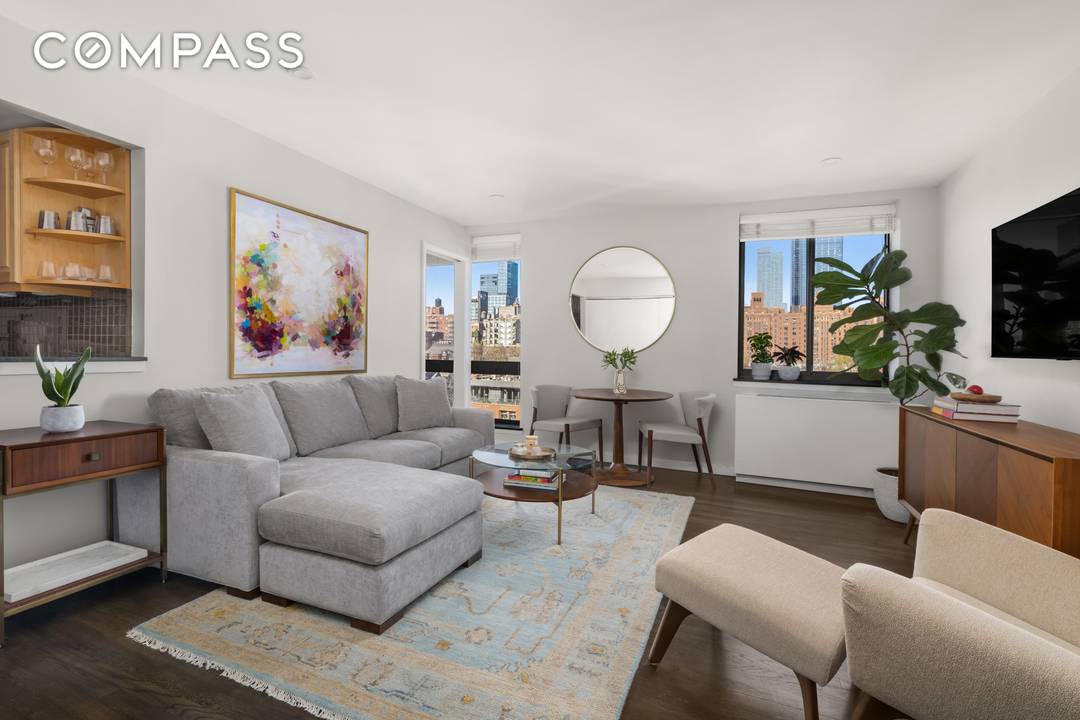 Residence 8H presents an elevated take on downtown living, perched on a high floor with sweeping, unobstructed views over the historic townhouses of Chelsea and north toward the Empire State ...