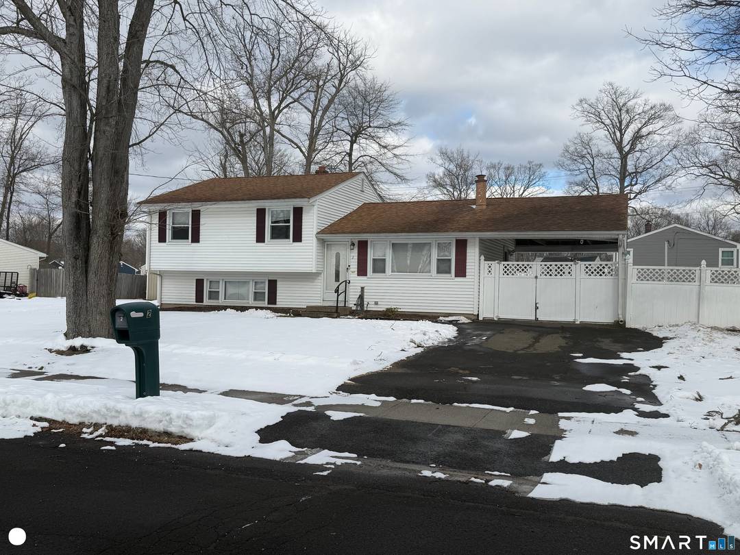 Welcome to this charming east side split level home, ideally located in a desirable Wallingford neighborhood.