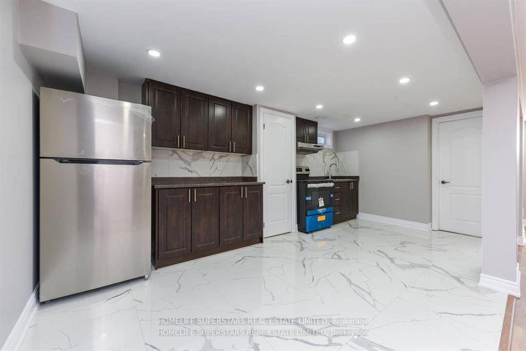 Brand New Never lived in Legal Basement, Immaculate, One Surface parking on the West side of Driveway, Existing Fridge, Stove, Cloth's Washer amp ; dryer for the Tenant use.