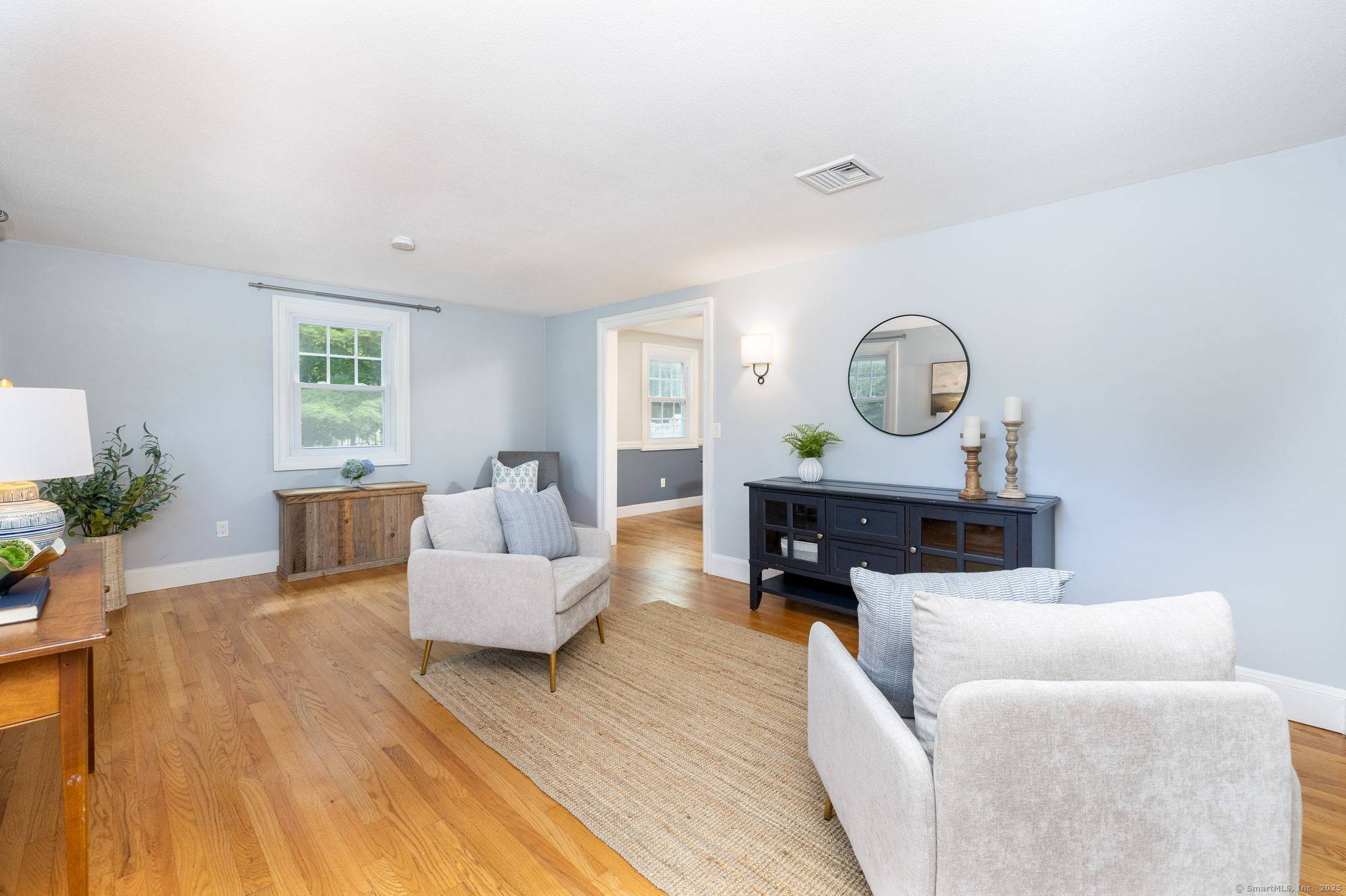 Beautifully maintained Colonial on a sunny corner lot with fenced backyard, and screened patio perfect for relaxing or entertaining.