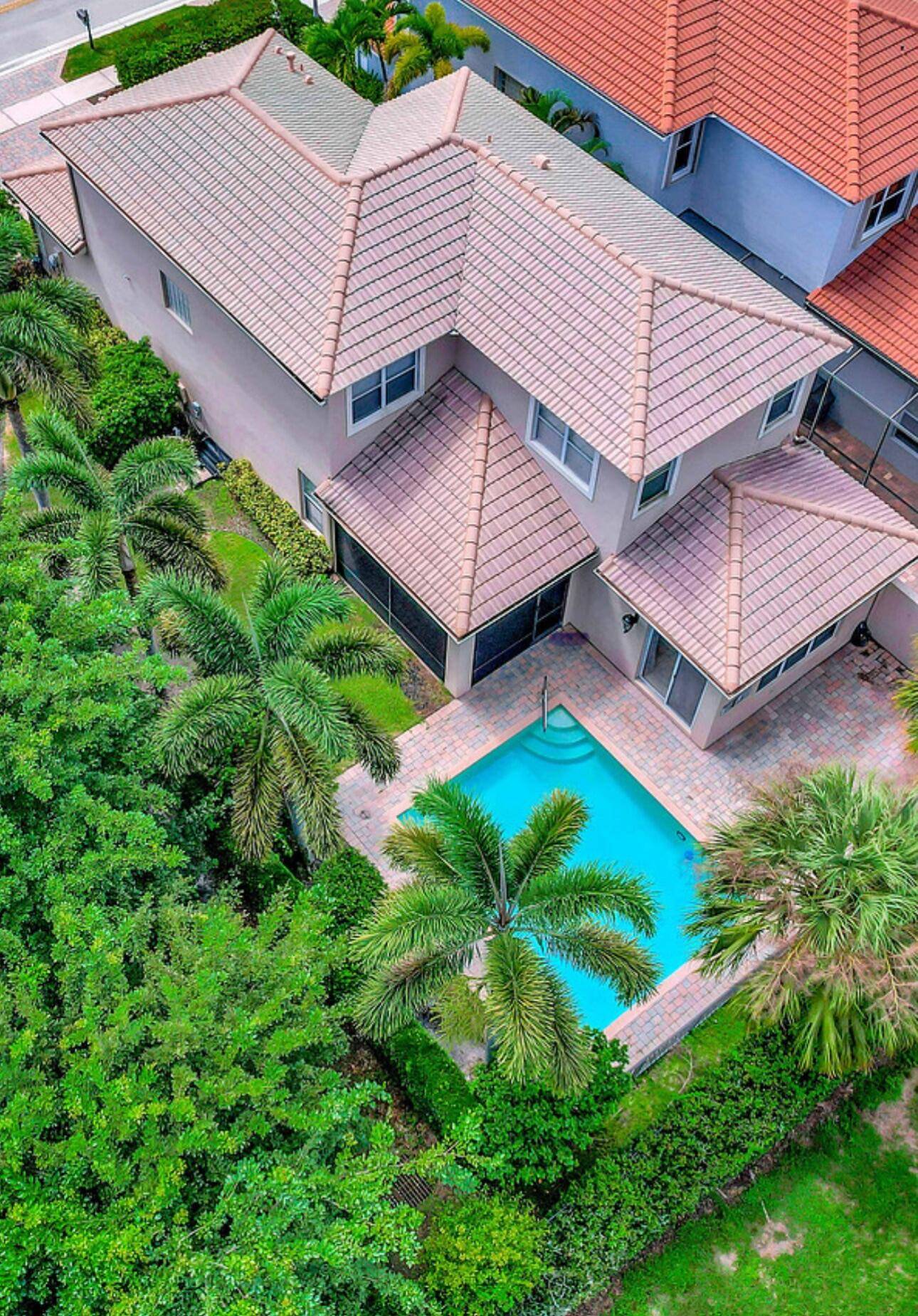 INDULGE IN YOUR OWN PRIVATE POOL RETREAT and experience the best of Palm Beach Gardens living in this bright and beautifully maintained 4 Bed 2.