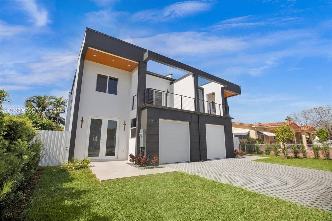 This newly constructed townhome, just minutes from Coral Gables, combines contemporary design with understated elegance.