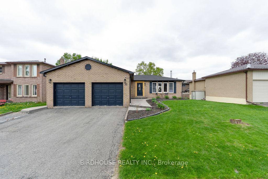 This charming brick bungalow with 2 car garage offers 3 2 bedrooms, 2 bathrooms, and spans a generous 1352 square feet.
