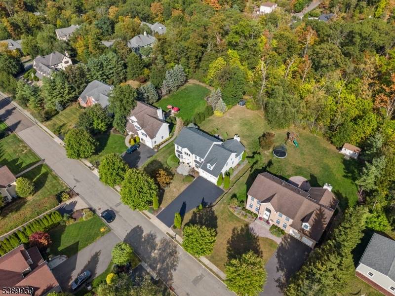 Desirable brick colonial in a fabulous neighborhood set on a large level lot.