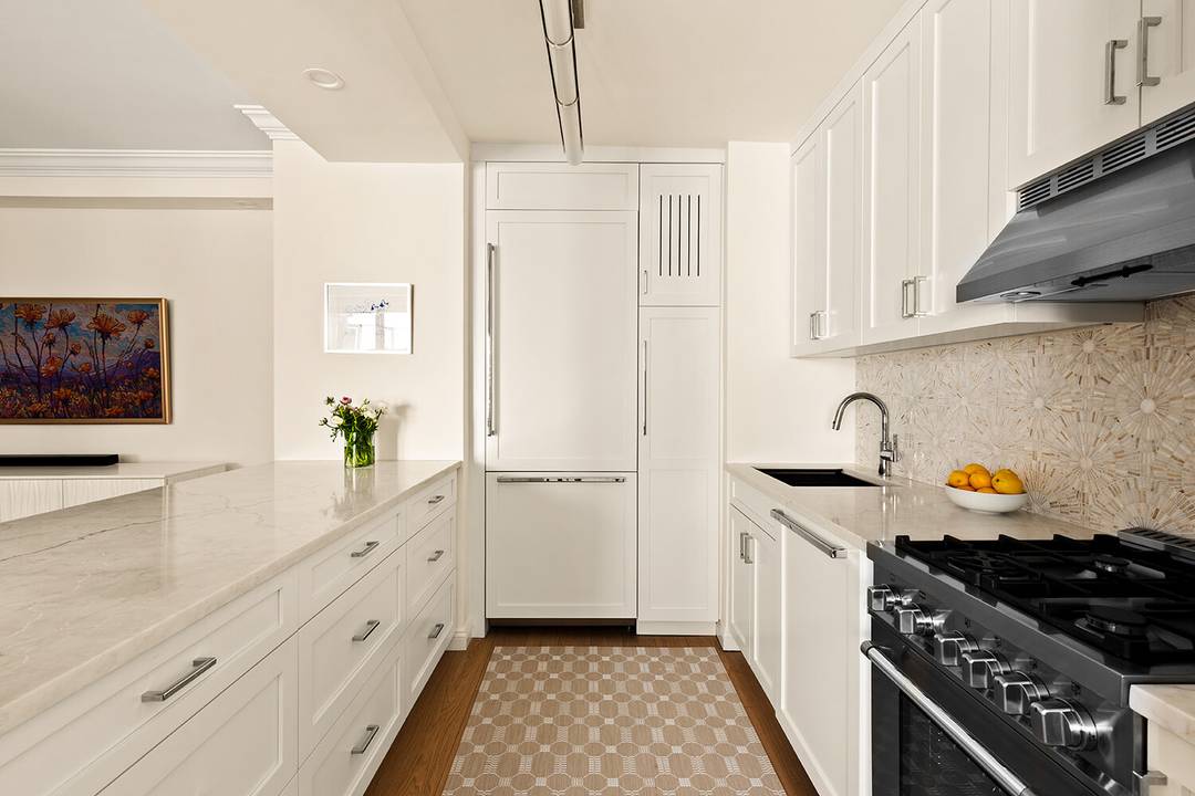 Apartment 11 O Turnkey Designer Renovation Spacious South Facing 1BR with Powder Room A comprehensive turnkey designer renovation completed less than one year ago has transformed this spacious, sun filled ...