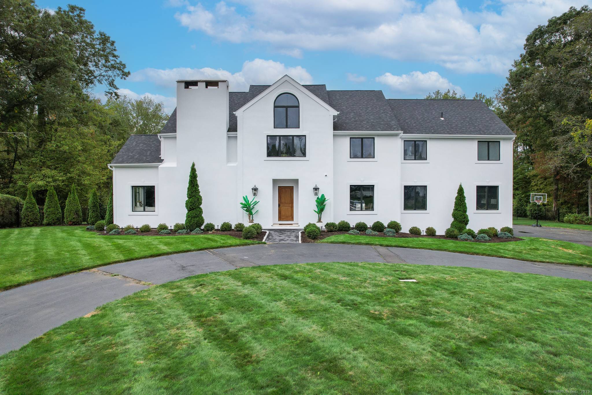 Tucked away on a quiet cul de sac, experience luxury living with this stunning home, offering full privacy.