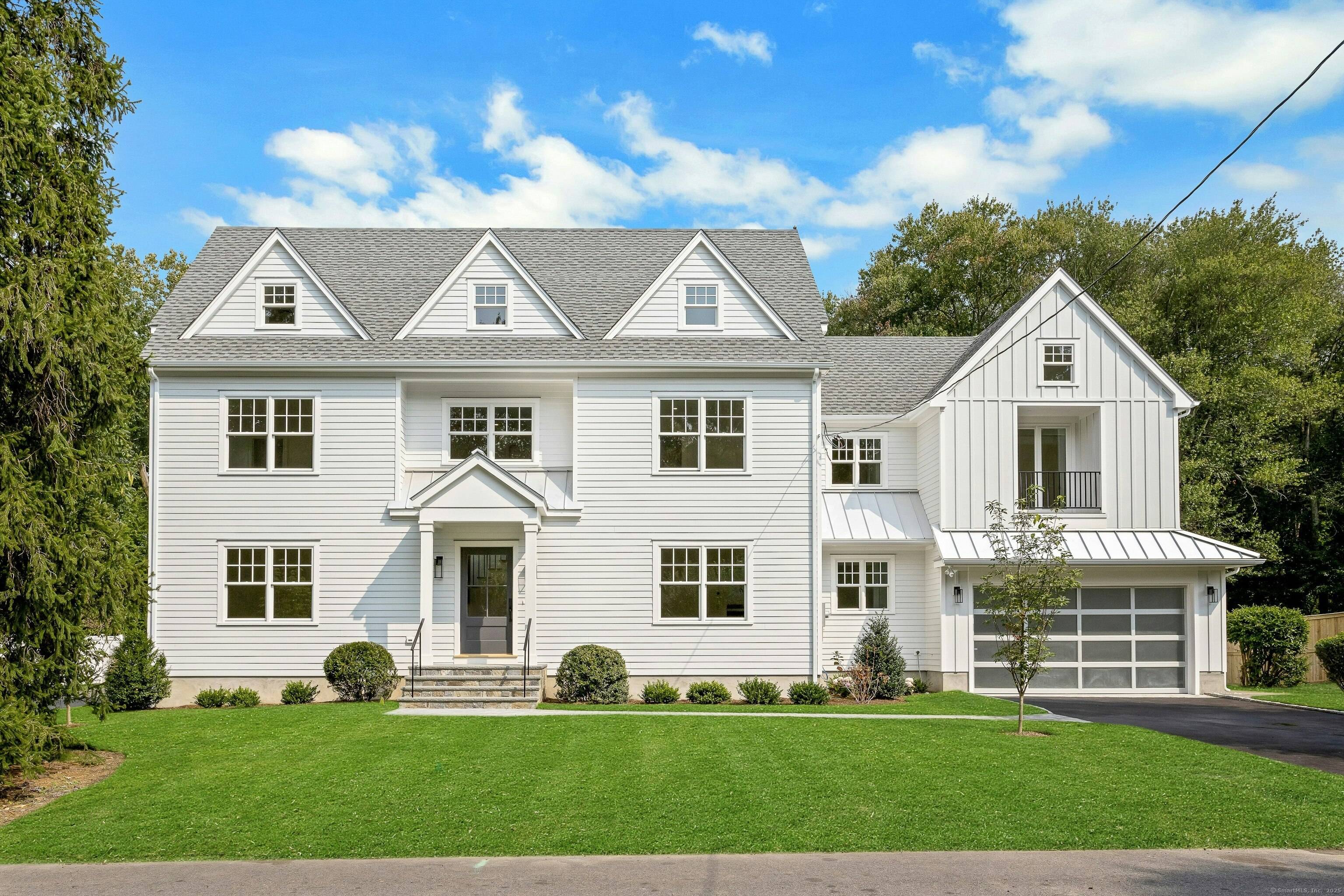 Spectacular, luxury new construction nestled in one of Darien's most lovely neighborhoods.