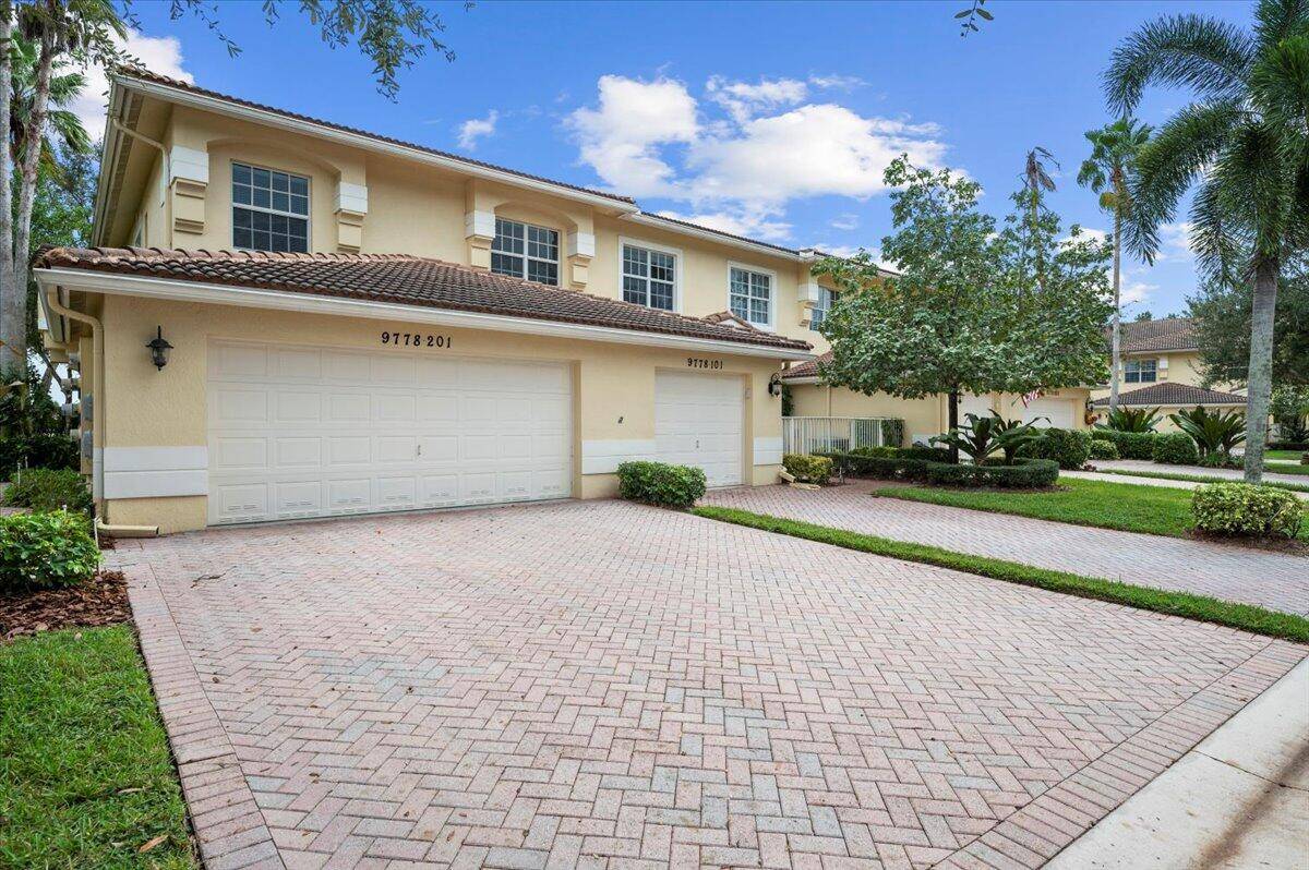 WELCOME TO THIS PRISTINE CORNER COACH HOME WITH STUNNING TREE TOP WATER VIEWS, EASTERLY EXPOSURE TO ENJOY THE BALMY FLA BREEZES.