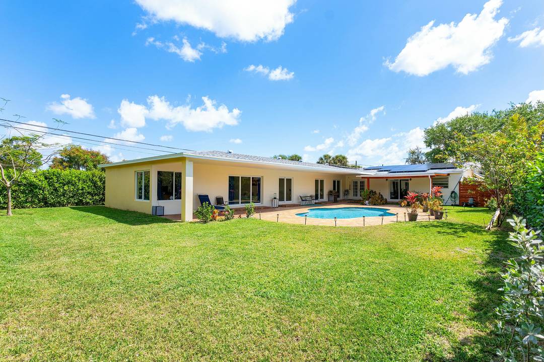 This spacious 5000 SF compound offers endless possibilities, just steps from Pineapple Grove and downtown Delray.