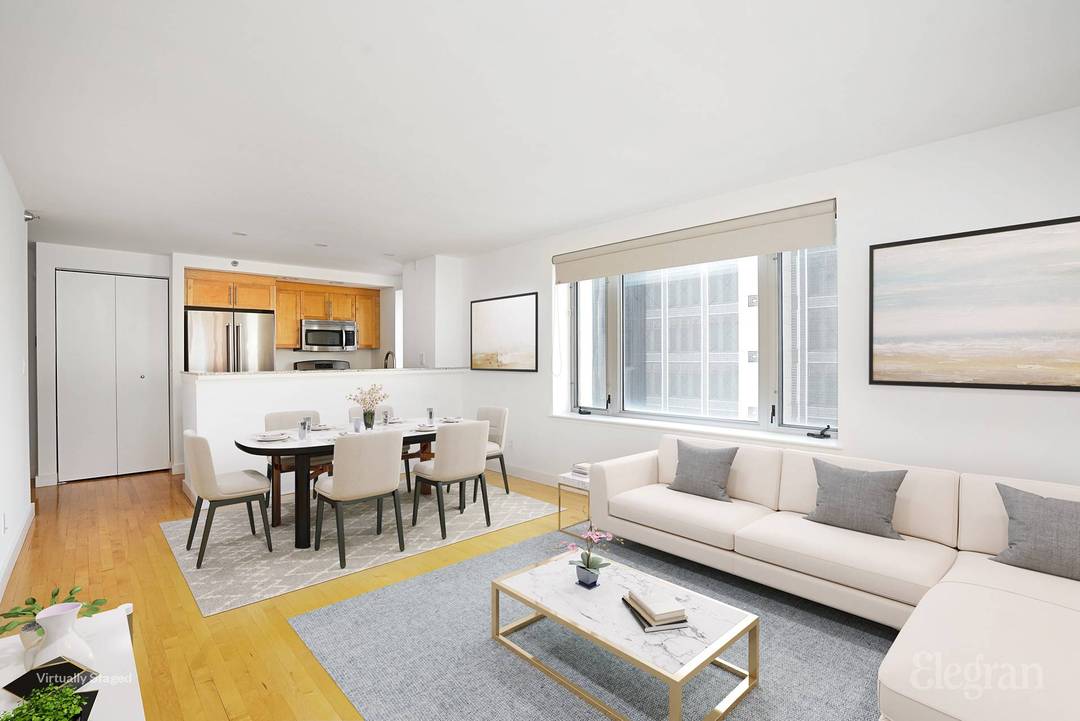 LIGHT, SPACE, COMFORT, AND BUILDING AMENITIES AT A REDUCED MARKET RENT !