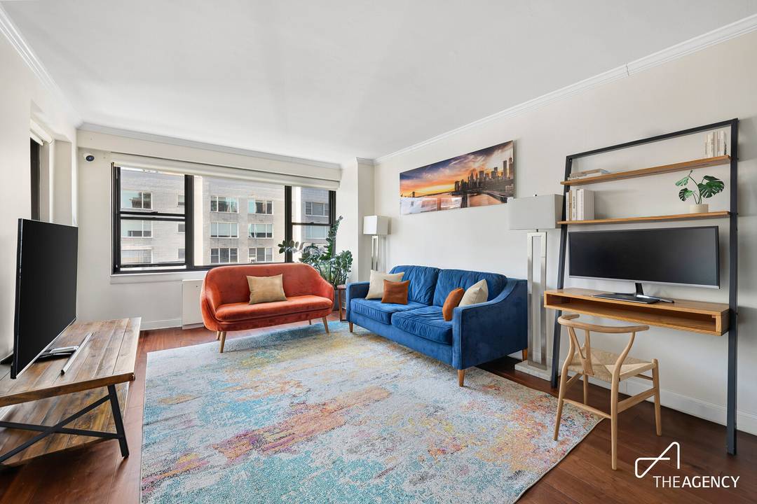 Welcome home to this beautifully renovated, sun filled three bedroom, two bathroom residence with private outdoor space in the full service Regency East.