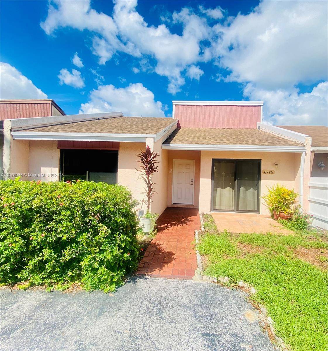 Well maintained 2 bedroom, 2 bathroom townhouse featuring a functional layout with an open living and dining area.