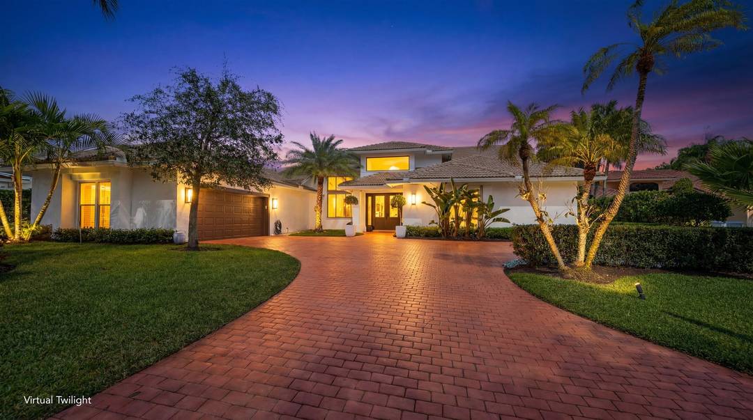 Located in the desirable Isle Brook neighborhood of Palm Beach Polo, this beautifully reimagined waterfront residence offers refined modern living with exceptional privacy.