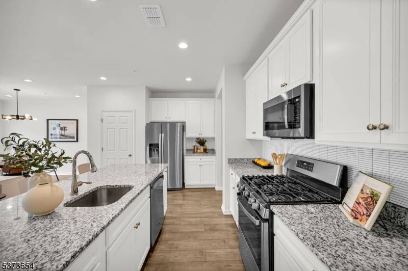 Welcome to this stunning two story Norfolk model located in the desirable Hilltop at Cedar Grove community.