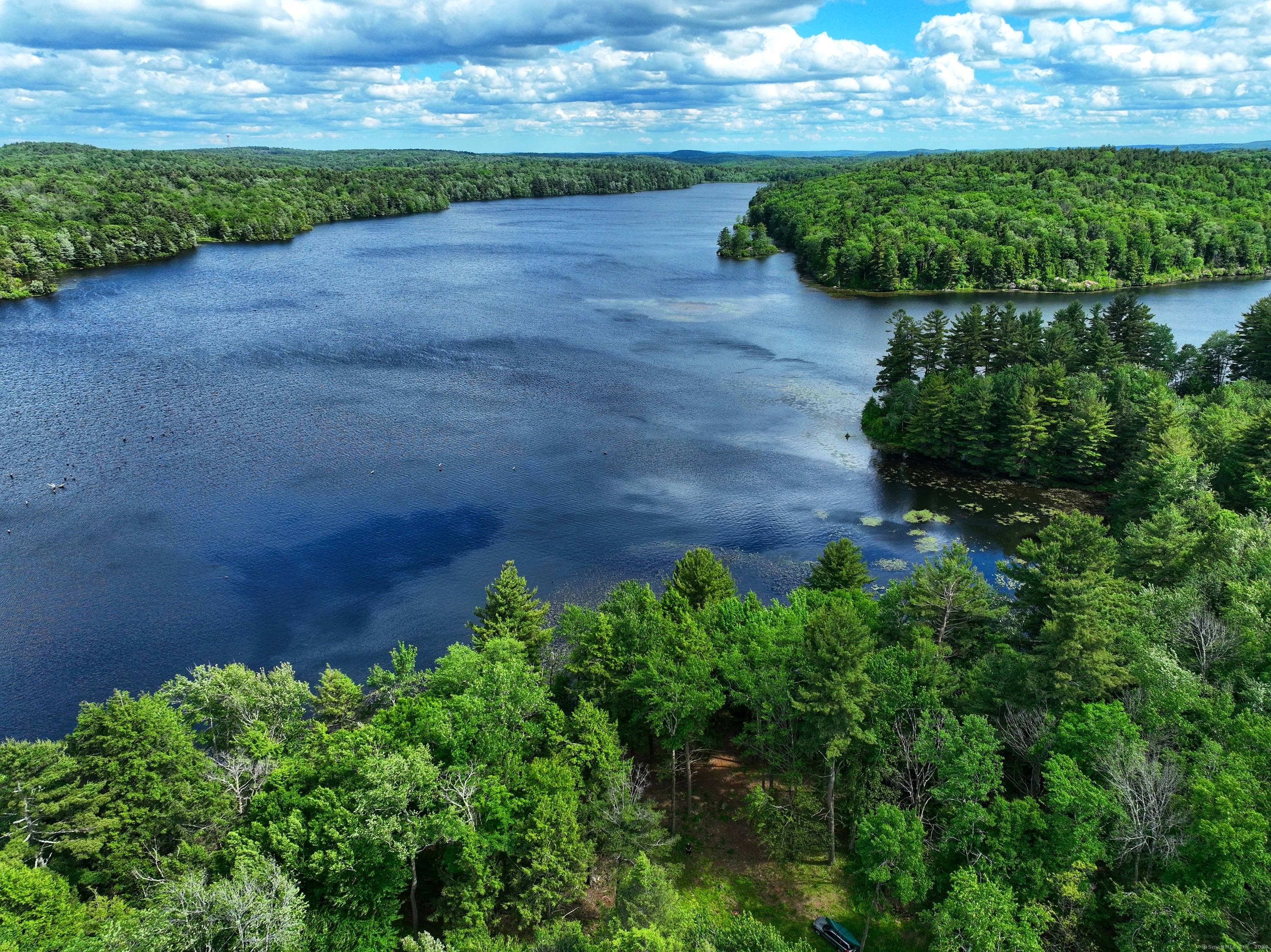 An opportunity to own a Litchfield County estate property with over 1, 300' of direct waterfront on tranquil undeveloped 242 acre Winchester Lake minutes from historic 18th Century Winchester Center.