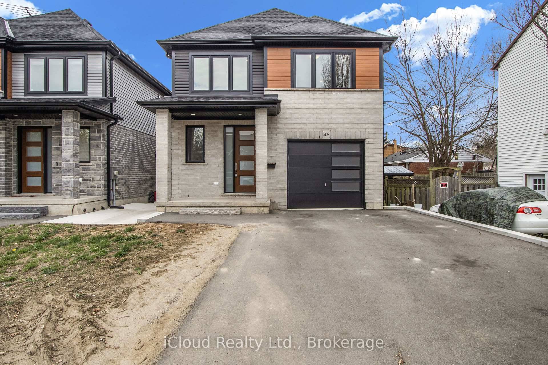 Welcome to 46 Lowell Street North in the heart of East Galt, Cambridge a meticulously crafted, newly built home that seamlessly blends modern design with functionality.
