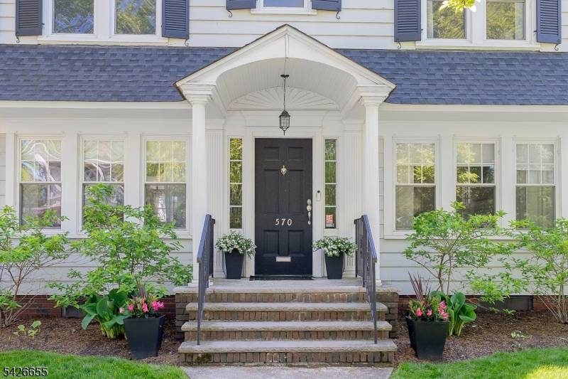 Completely updated classic Center Hall Colonial with exceptional curb appeal, seamlessly blending timeless character w spacious, comfortable living.