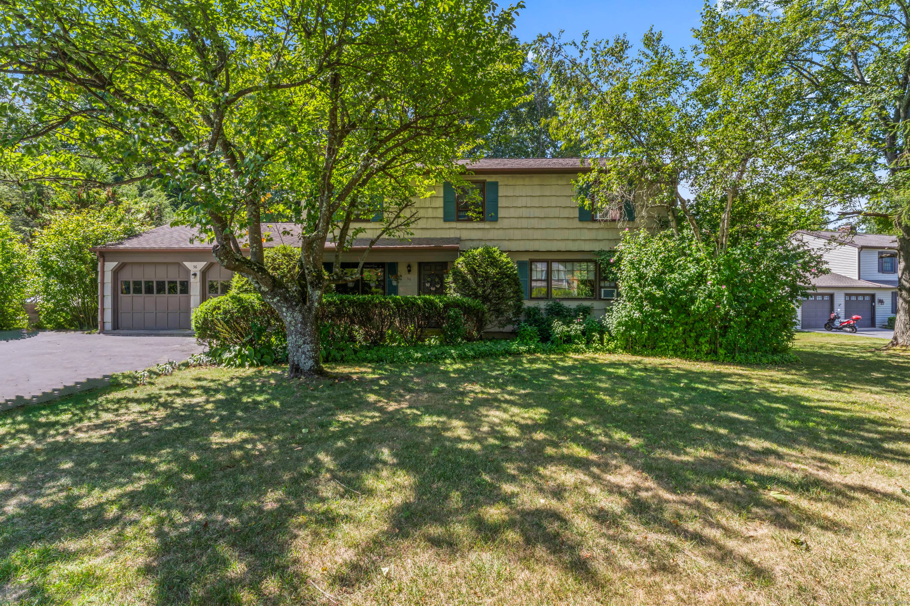 Welcome to 56 Ridgedale Road, nestled in Bethel's desirable Chimney Heights neighborhood.