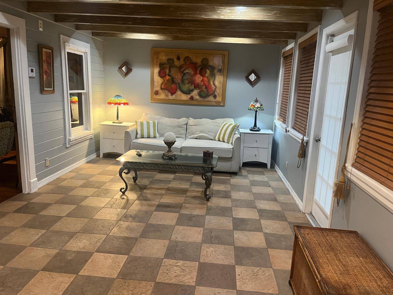 Vintage Home built in 1925, The wood paneling is unique, cherry wood floors, The family Room is the icing on the cake with its wood beams and views of the ...