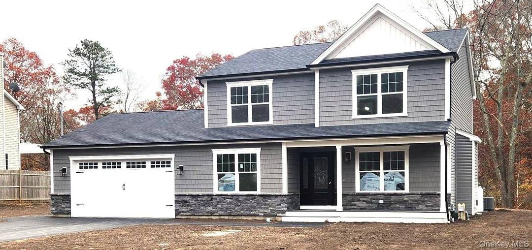 Welcome to this Gorgeous Craftsman Style Center Hall Colonial, This Stunning Residence is Located on a Tree Line Manicured Dead End Street, all Large Properties.