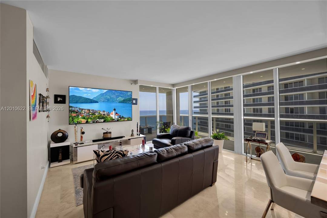 Beautifully upgraded corner residence at Beach Club Towers Tower III featuring 2 Bedrooms Den and 2 bathrooms.