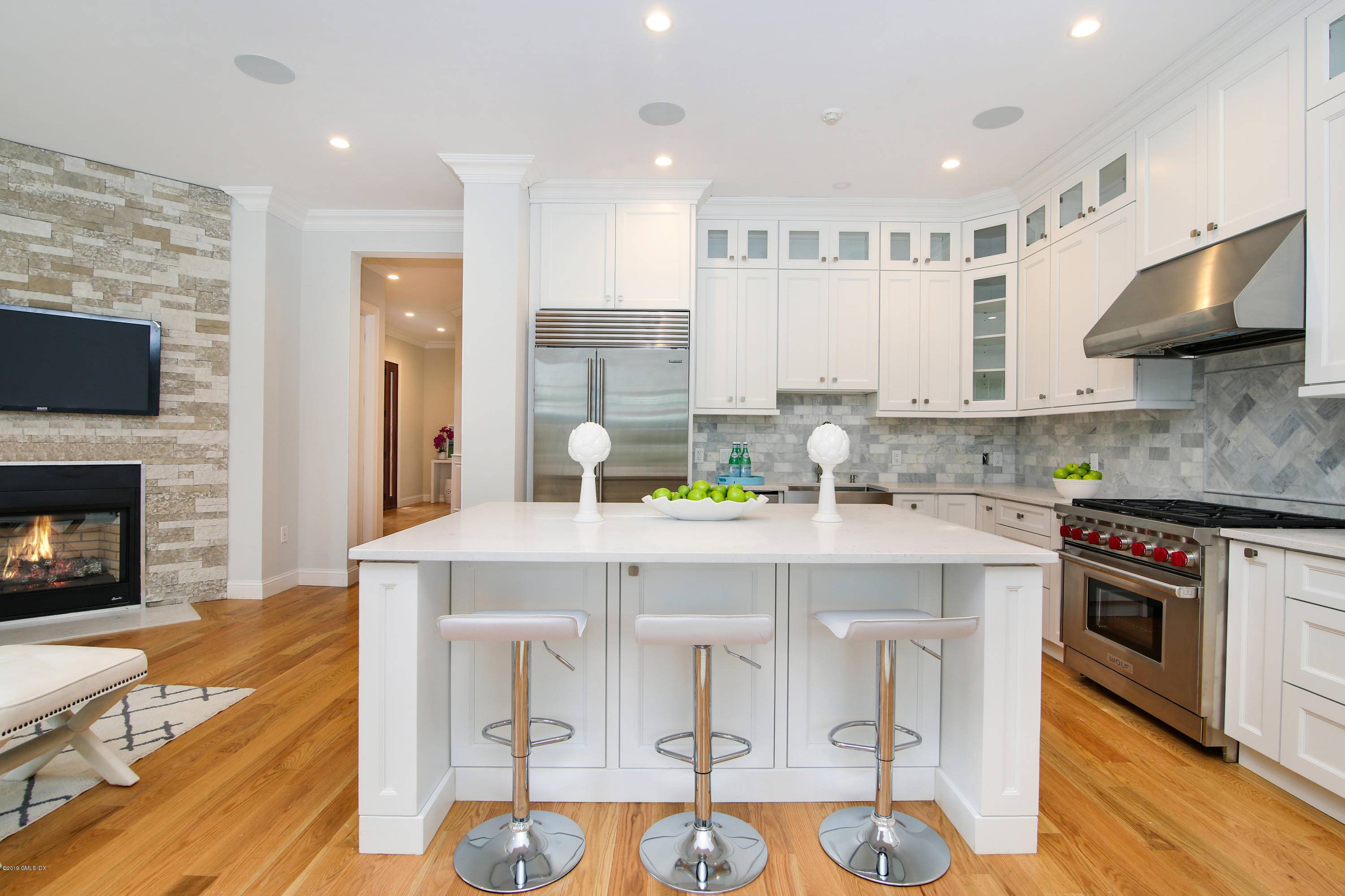 Luxurious, brand new construction four bedroom 3, 525 square foot townhome boasts stone patio, landscaped yard and attached two car garage convenient to schools, shopping and trains.