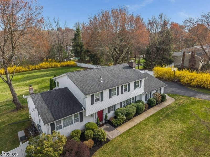Classic Colonial in Mendham Borough blends timeless charm with modern comfort.