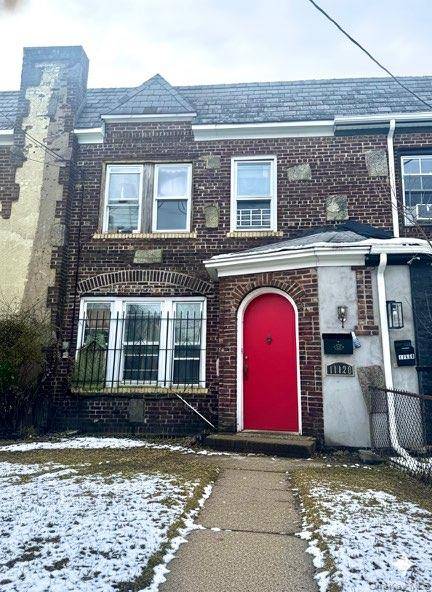 Discover this single family Tudor home for sale in Jamaica, Queens.