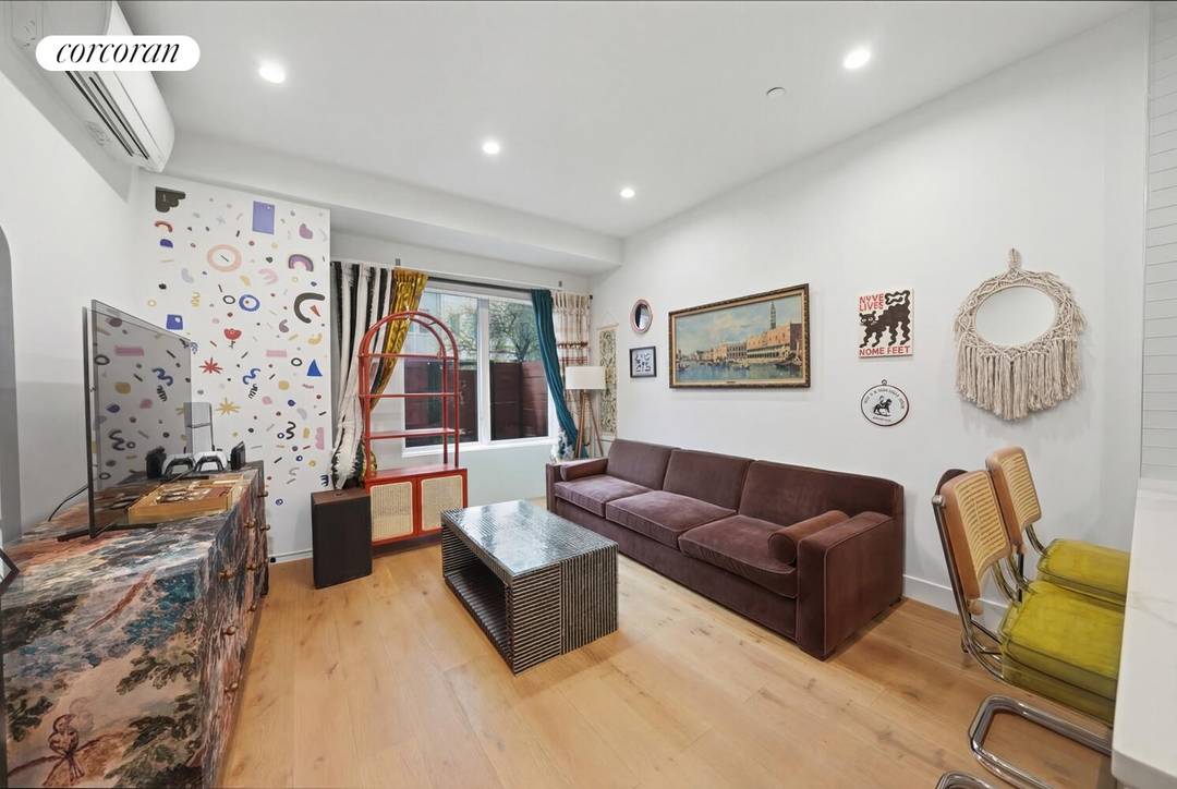 Welcome to 256 Winthrop Street, Unit 1A a modern, oversized studio that lives like a true one bedroom, complete with private outdoor space.