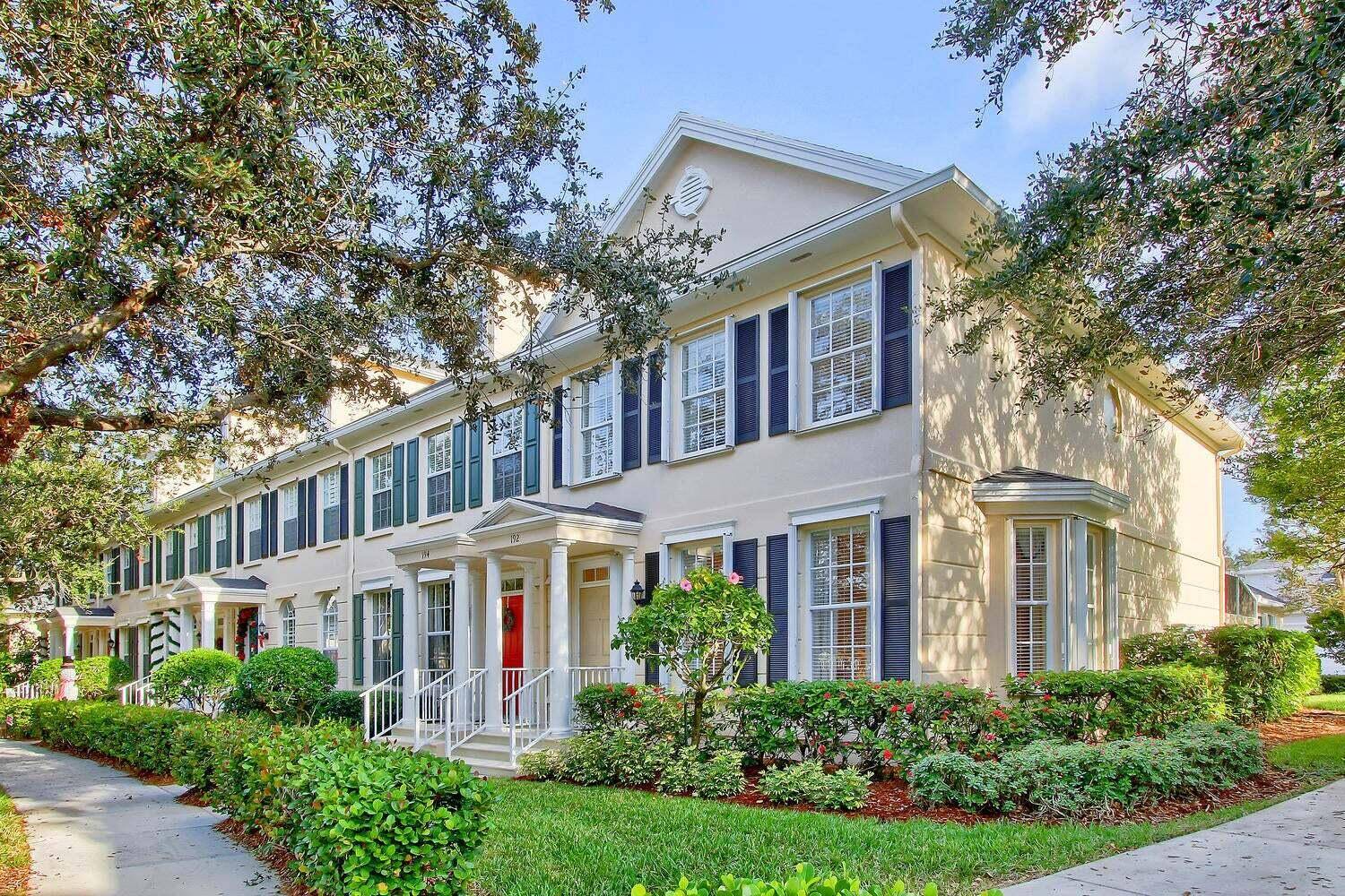 Don't miss this bright, cheery freshly painted end unit townhome nestled into the heart of NewHaven Abacoa.