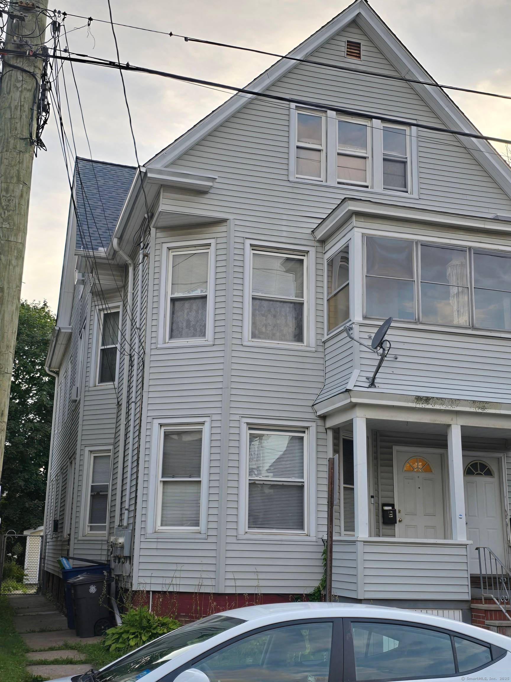 A three family property with spacious bedrooms and living space offering plenty of storage and private level back yard for entertaining.