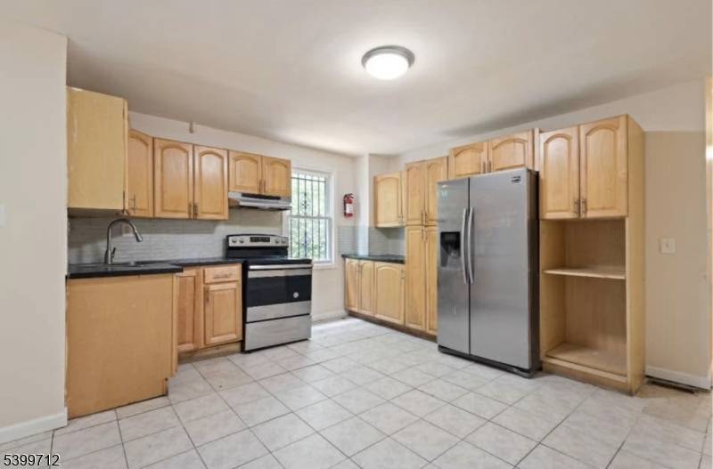 Discover the perfect investment opportunity with this large, well maintained 2 family home featuring a bonus attic apartment.