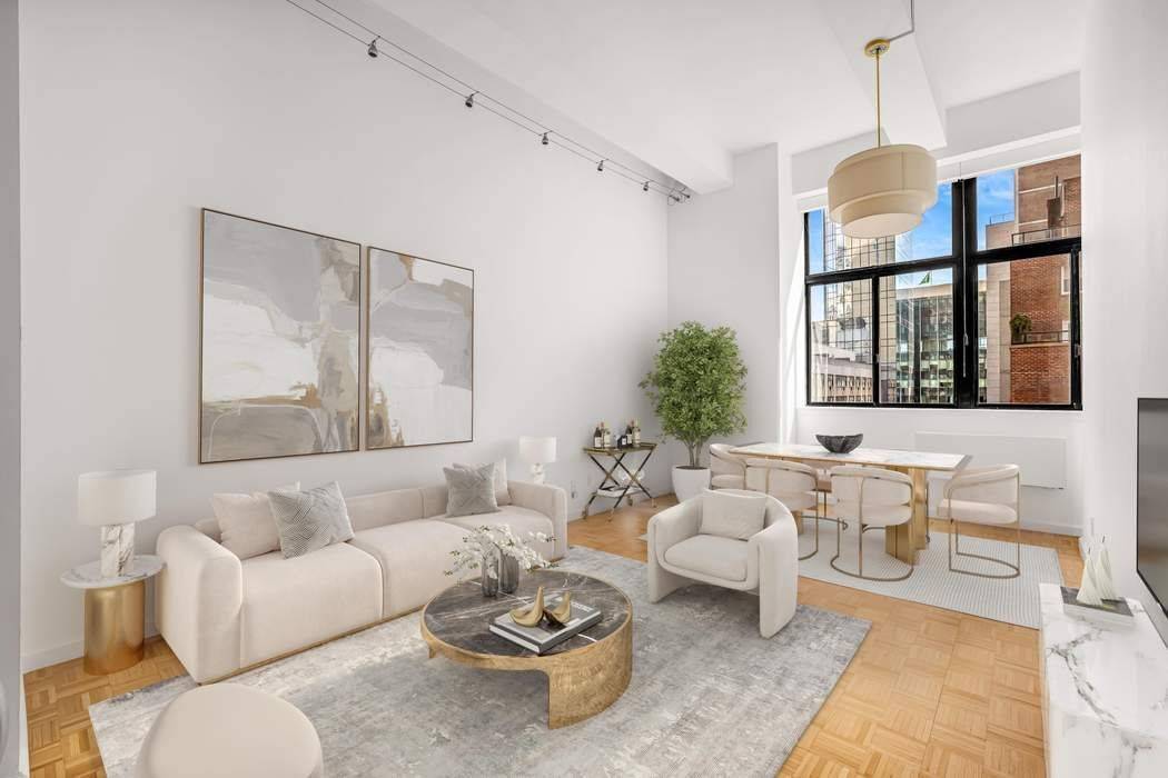 Step into this extremely unique one bedroom plus standing sleep loft home office residence in the heart of Midtown in one of the most coveted pre war loft buildings.