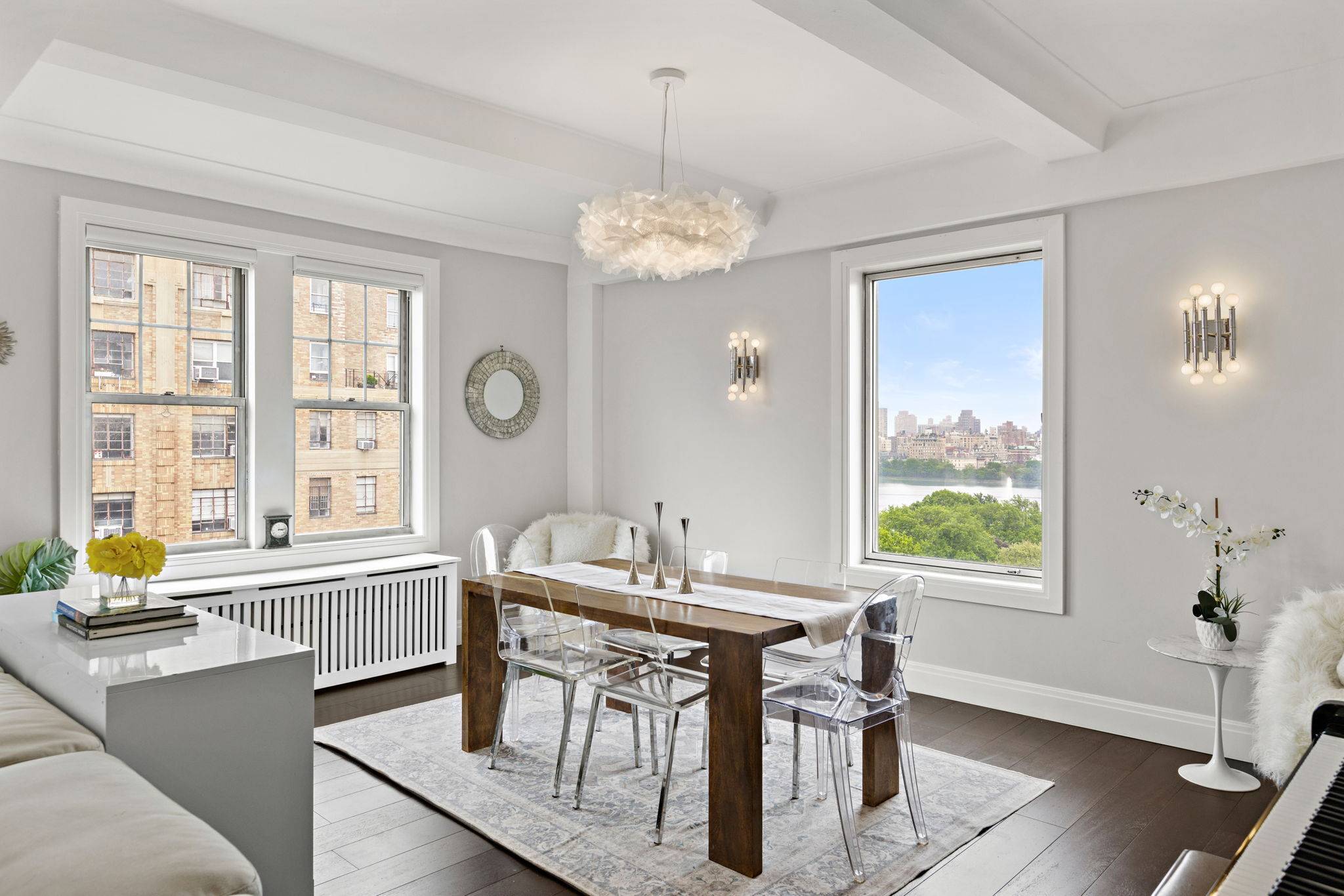 3 bed 3 bath with Breathtaking Views Top Floor Oasis on the Upper West Side Perched atop a distinguished boutique co op just steps from Central Park West, 10 West ...