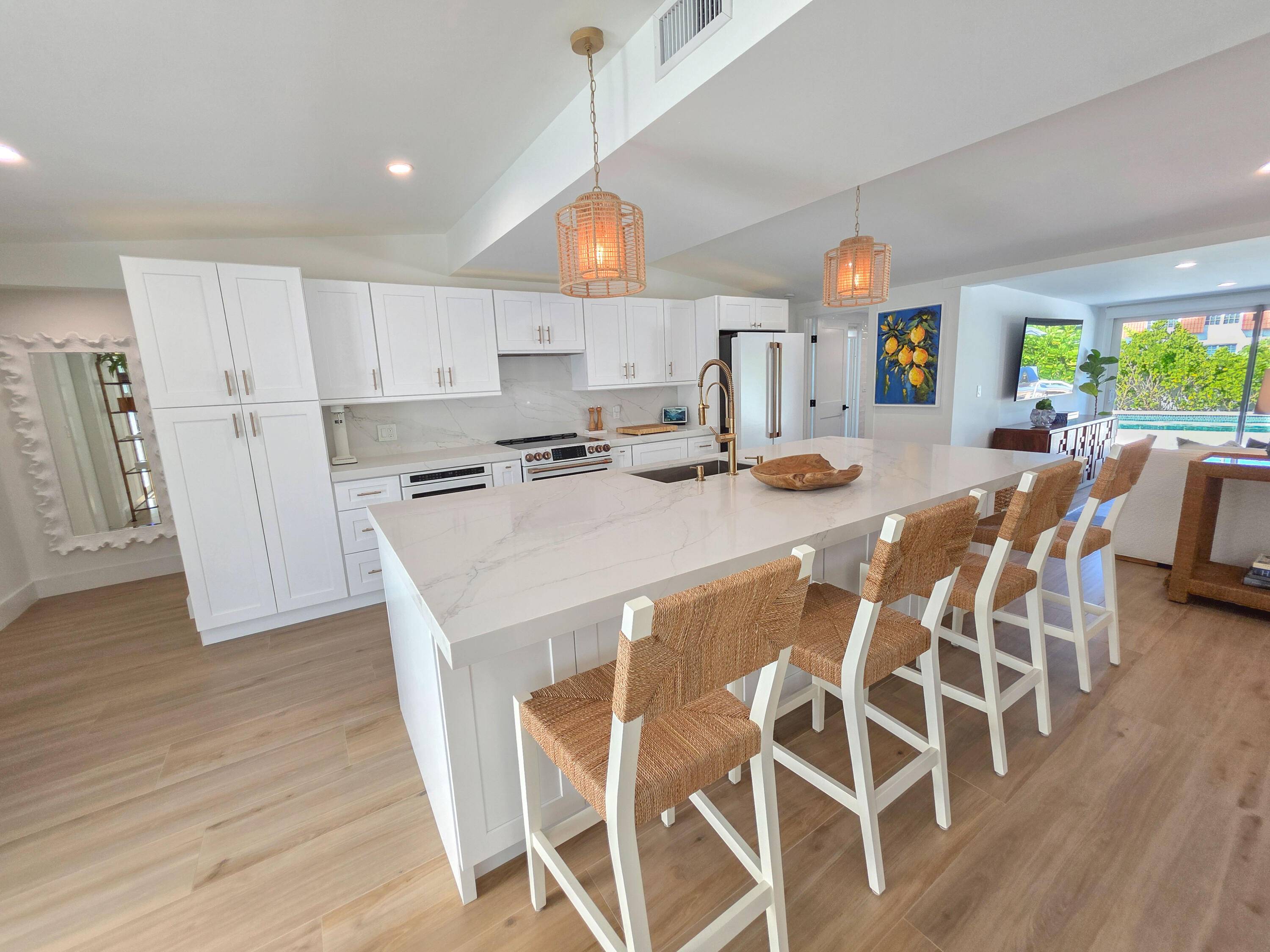 Live the dream lifestyle in this fully remodeled home located in the heart of North Palm Beach !