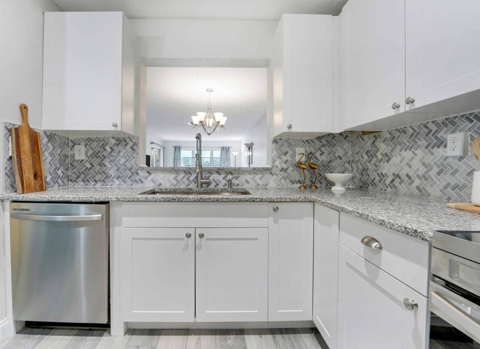 Elegantly Remodeled, Spacious Bright Corner 2BD 2BA Condo with water views !