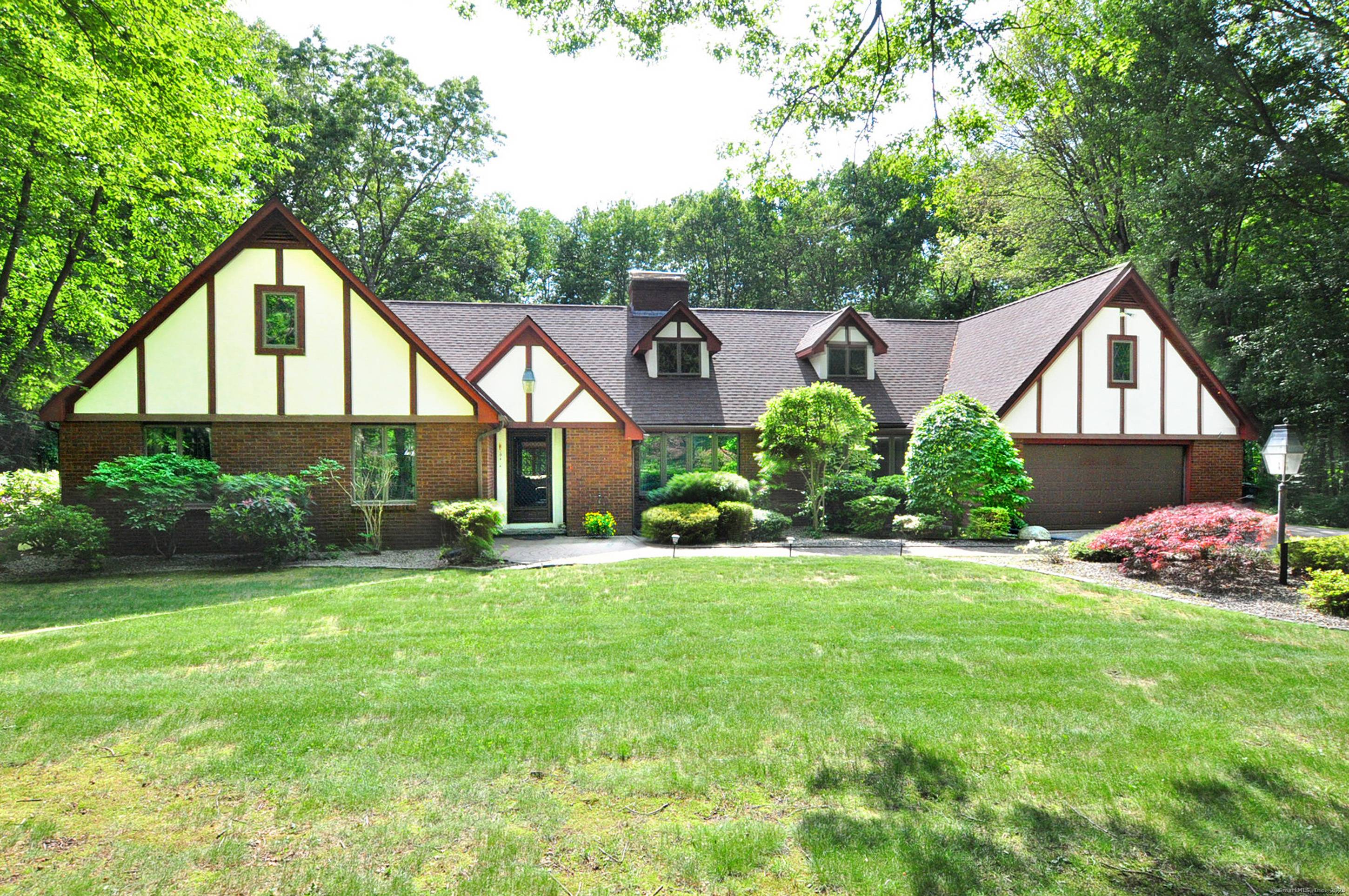 Welcome home to this Tudor Ranch style home with 4 bedrooms, 2.