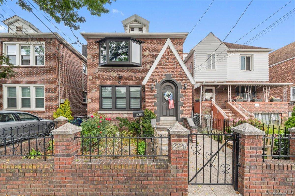 This stately, brick, and detached two family plus basement is being offered for the first time in 58 years.