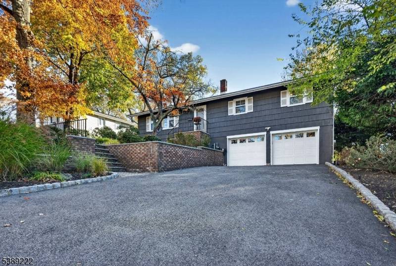 Welcome to this beautifully maintained and updated raised ranch featuring 3 spacious bedrooms and 1.