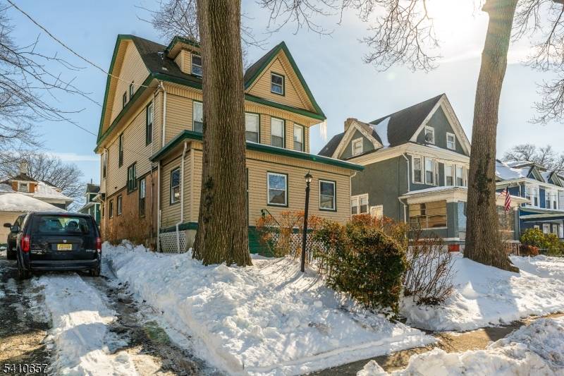 Step into the charm of this classic Colonial nestled in the sought after Forest Hills section of Newark.