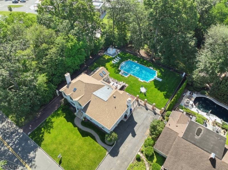 Welcome to this stunning custom home in sought after Mountainside, offering nearly 3, 900 sq.