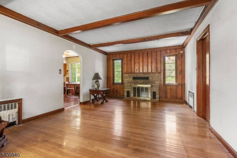 Set in the highly sought after area of Montville, this charming ranch offers over 1.