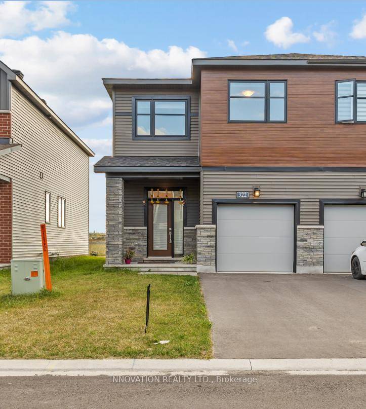 Welcome to 322 Gisborne Place, a stunning Minto Laguna end unit townhome nestled in the highly sought after Morgans Grant neighborhood of Kanata.