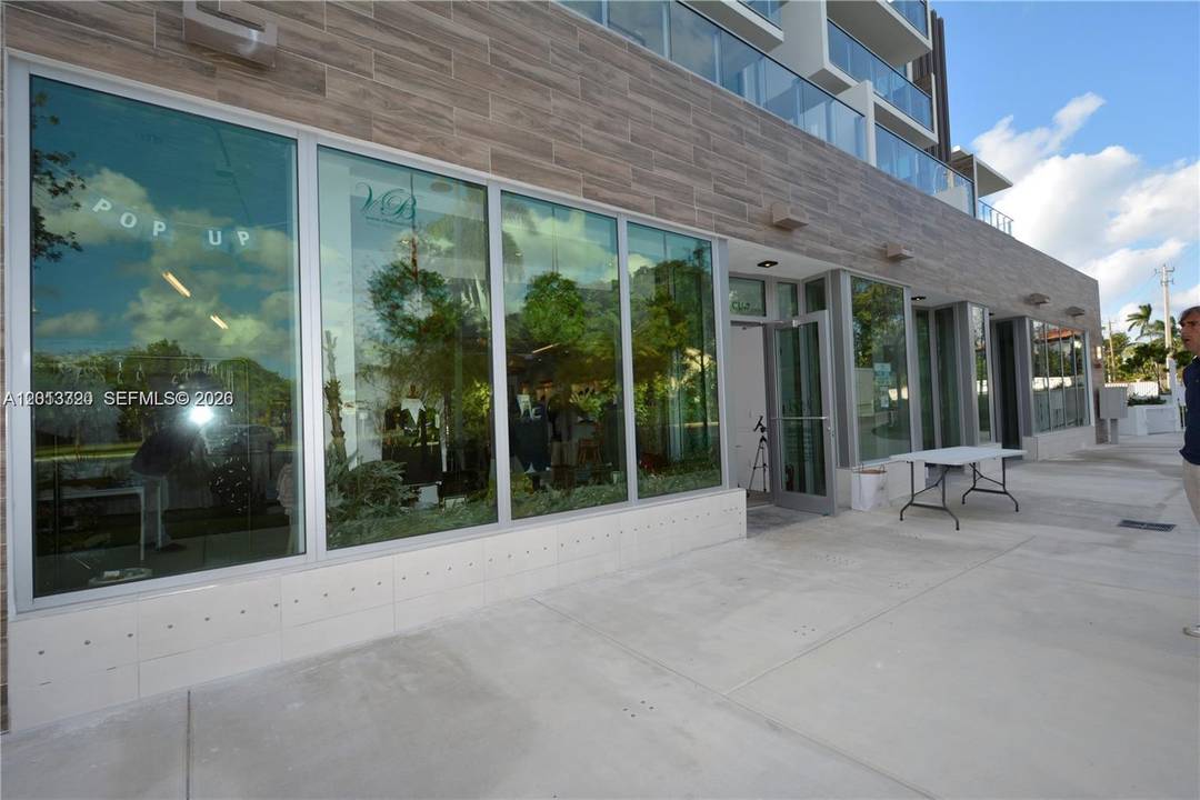 Highly desirable street front retail space featuring floor to ceiling glass walls, ideally positioned just outside the gates of the prestigious Sunset Harbor residential community.