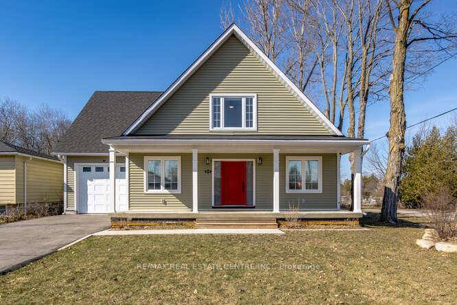 Stunning 5 Year Old Home, Loads of Curb Appeal with Large Covered Porch and Oversized Front Door.