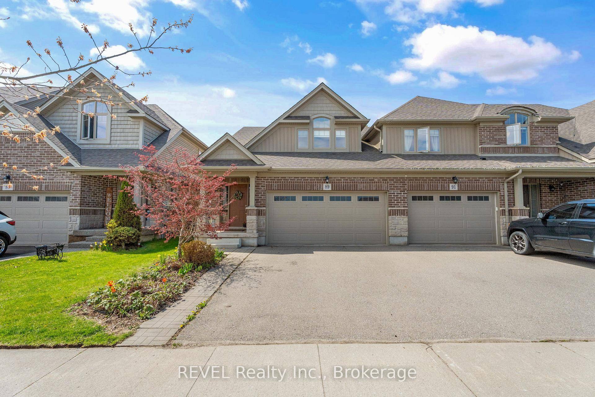 Beautiful Freehold End Unit Townhome in Prime Location No Condo Fees !