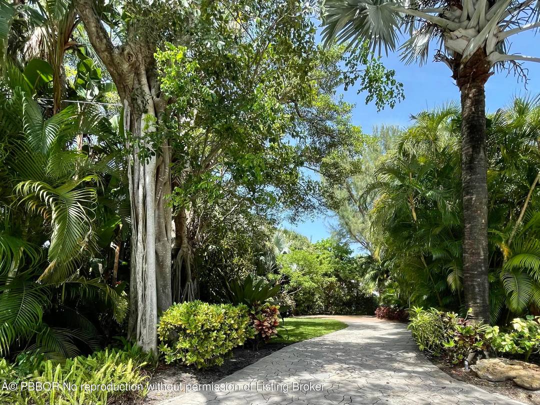 Waterfront charmer offers a dock with lift in a choice location on Hypoluxo Island between Palm Beach and Manalapan.