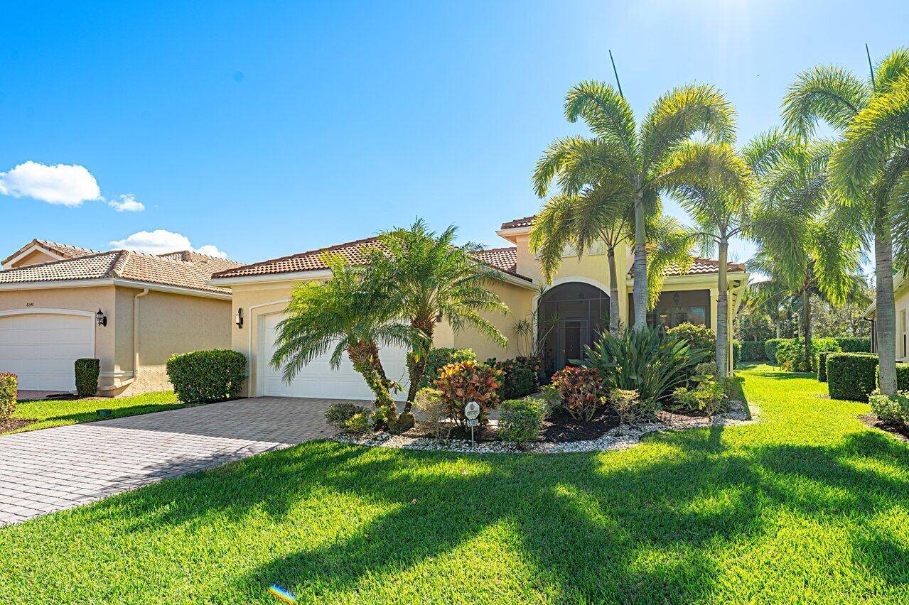This beautifully appointed Rebecca model sits on a lovely lakefront lot.