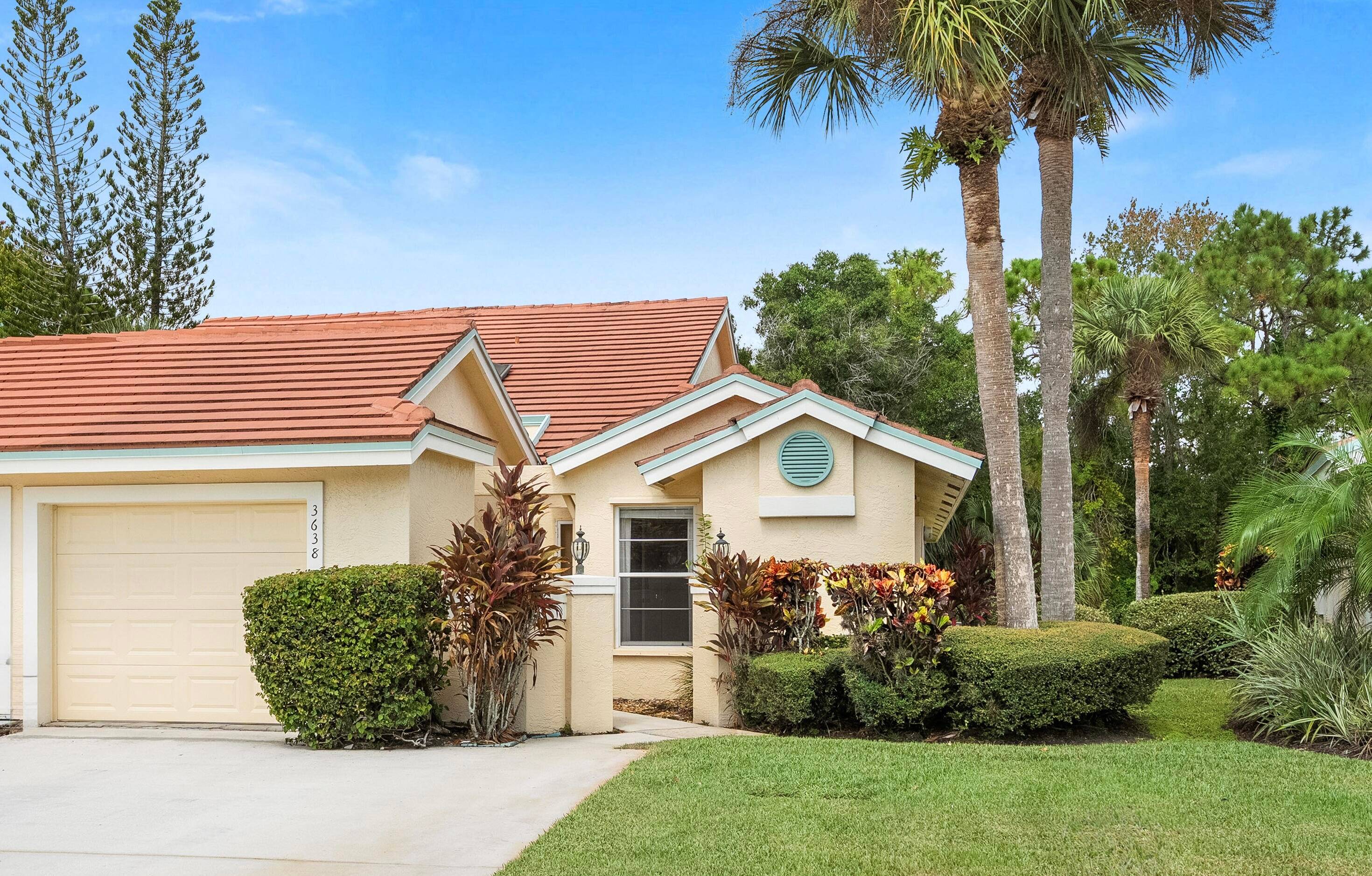 Resort style living in Whispering Sound, a vibrant, active adult 55 gated community in Palm City !