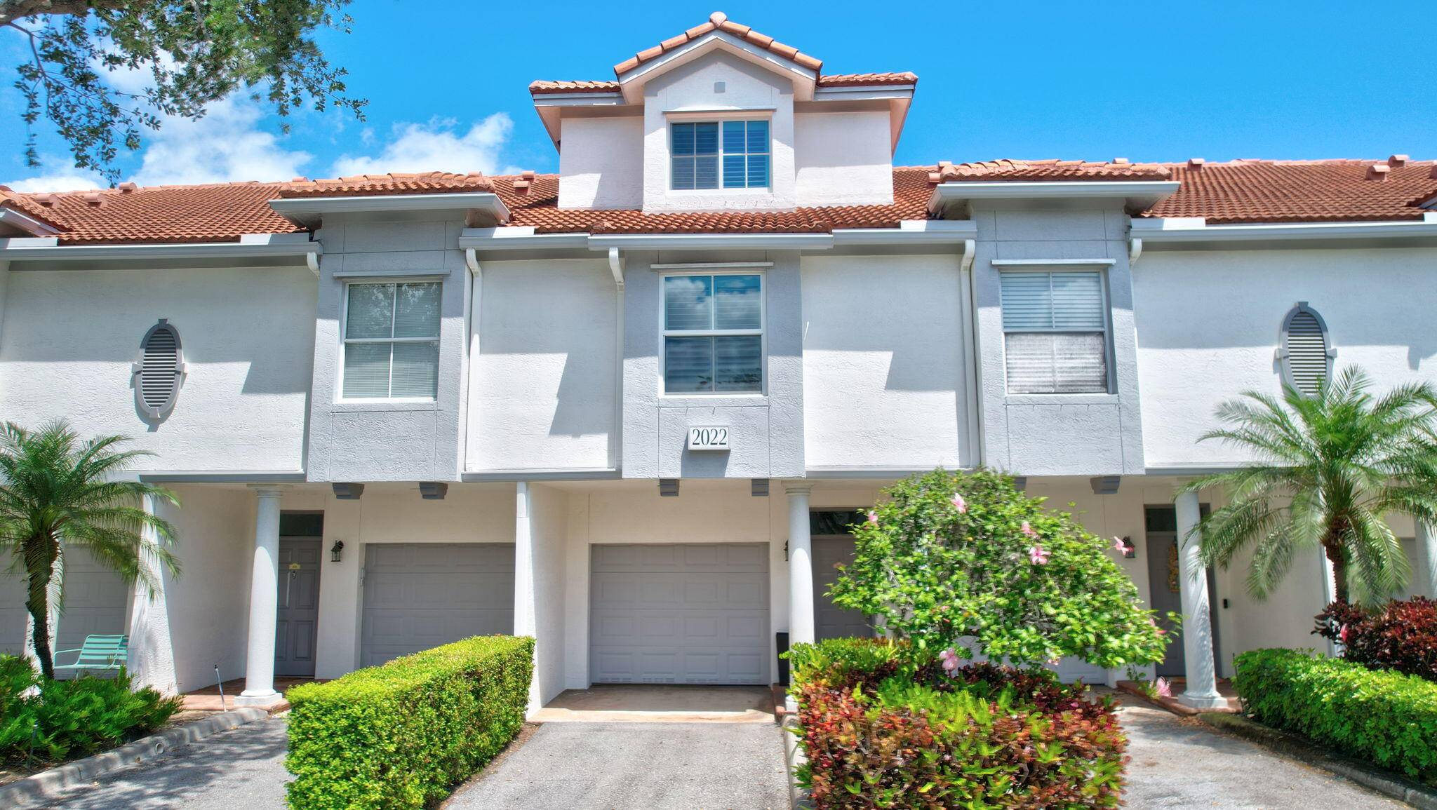 Immaculate, rarely available, largest in living sqft, three bedroom, two bath, townhome w attached one car garage includes built in wood shelves for storage.